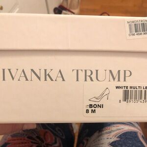 Silver low heel pumps